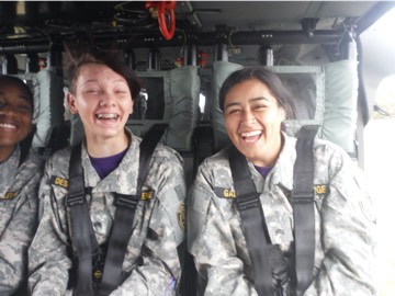 Female cadets while flying in a helicopter