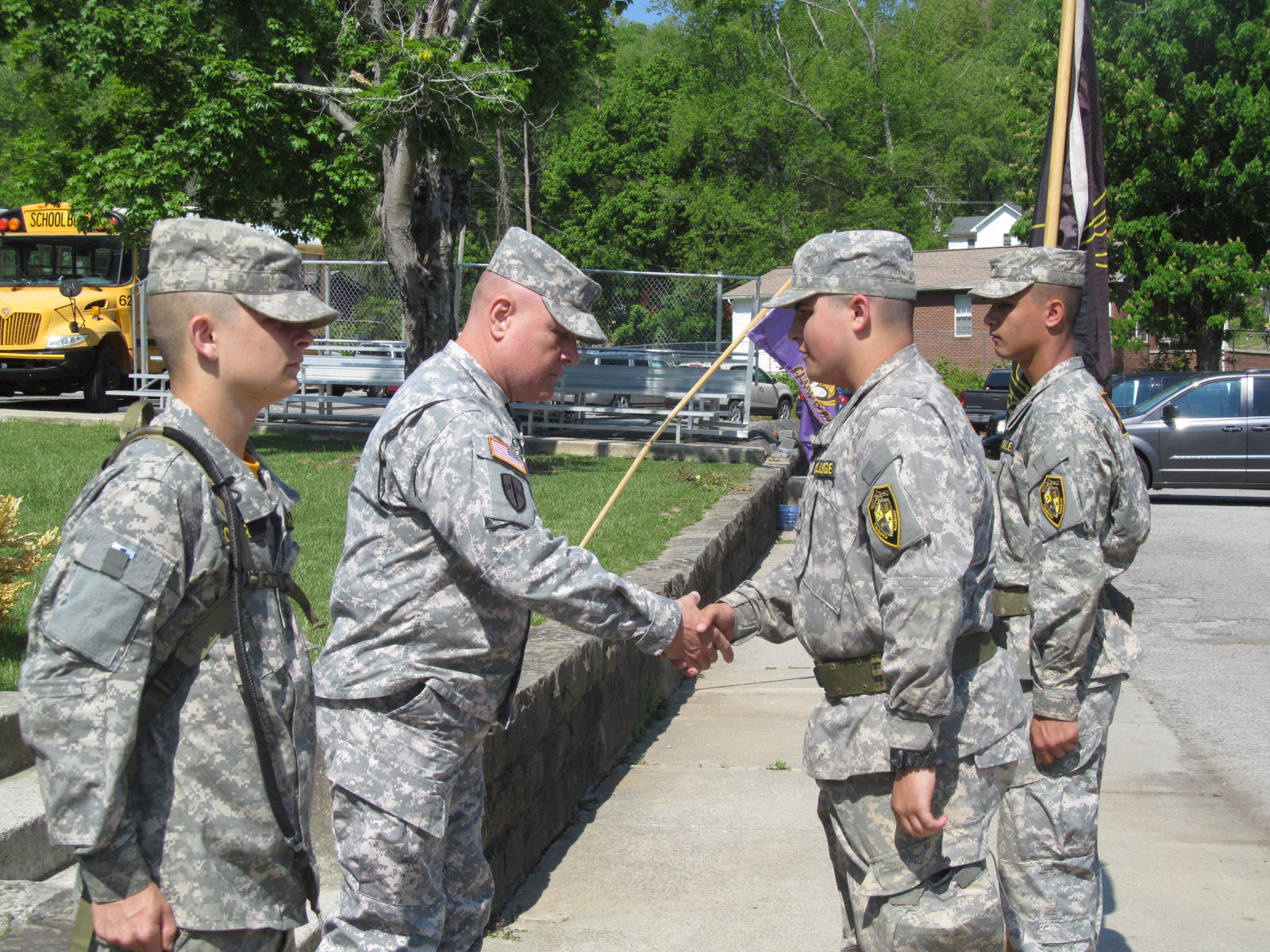 Cadets shaking the staff's hand